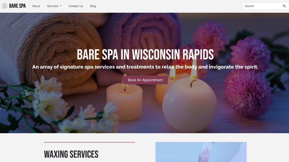 Bare Spa homepage featuring calming candles, flowers, and soft towels, promoting spa services with a 'Book An Appointment' button